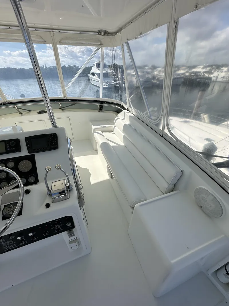 Slide: The Image of Interior view of 1992 Hatteras 50 Convertible yacht with helm and seating area. - 47