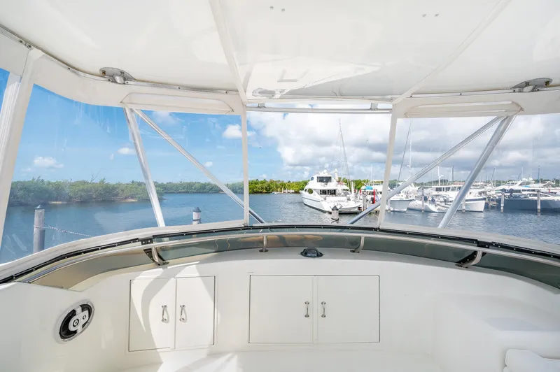 Slide: The Image of Interior view from the helm of a 1992 Hatteras 50 Convertible yacht. - 8