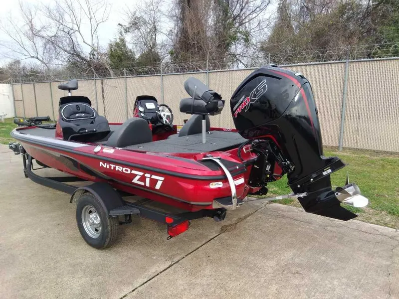 Slide: The Image of 2024 Nitro Z17 fishing boat with powerful outboard motor on trailer. - 3
