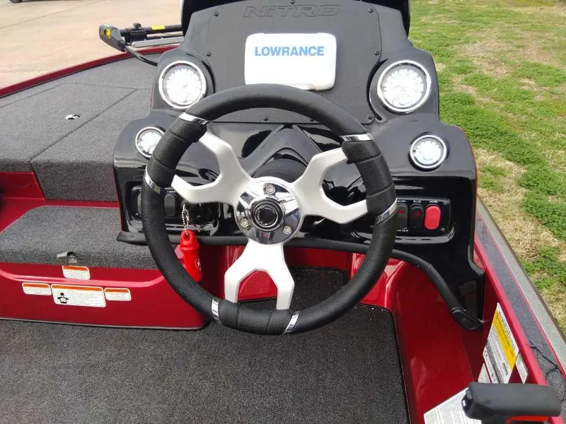Slide: The Image of Steering wheel and dashboard of 2024 Nitro Z17 boat with Lowrance electronics. - 4