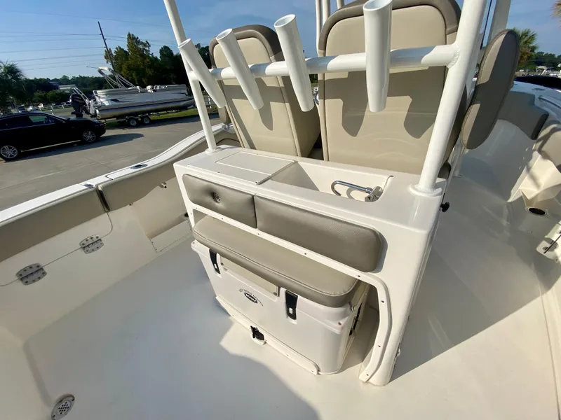 Slide: The Image of 2022 Key West 263 FS boat interior with seating and storage compartments. - 17