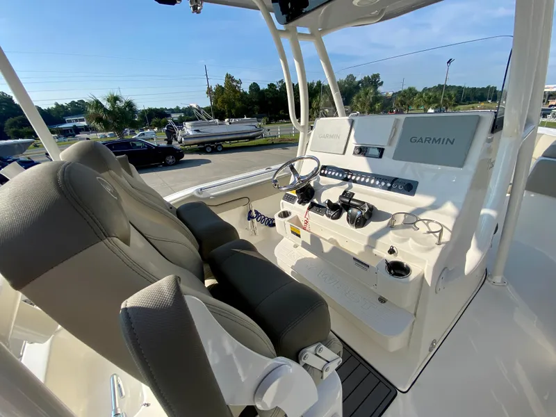 Slide: The Image of 2022 Key West 263 FS boat cockpit with Garmin navigation system. - 22