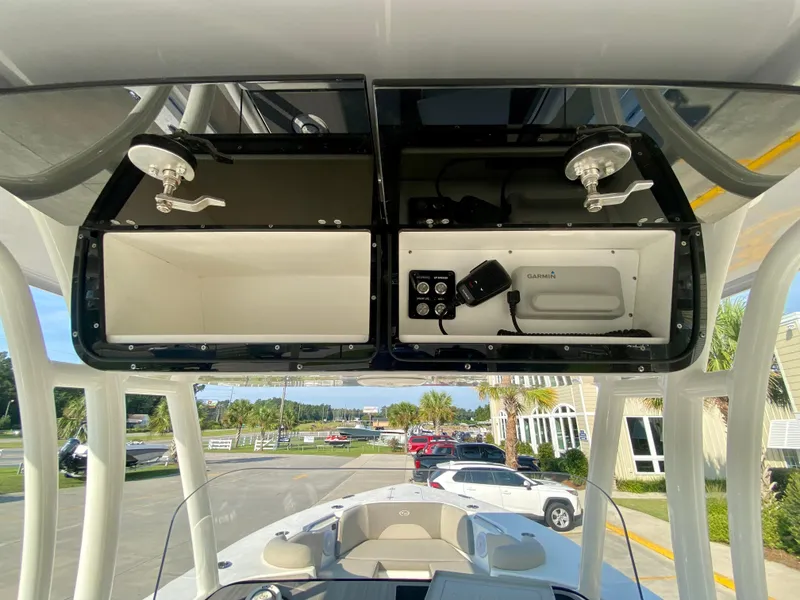 Slide: The Image of 2022 Key West 263 FS boat storage compartments and electronics. - 31