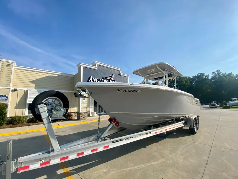 Slide: The Image of 2022 Key West 263 FS boat on trailer outside Angler's Marine. - 3