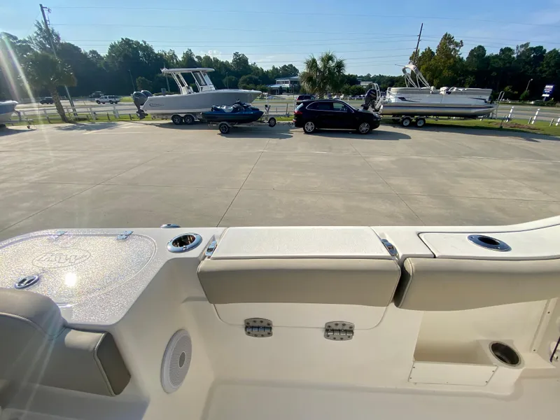 Slide: The Image of 2022 Key West 263 FS boat interior with view of parking lot and trailers. - 14