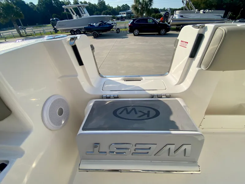 Slide: The Image of 2022 Key West 263 FS boat interior with seating and speaker. - 15