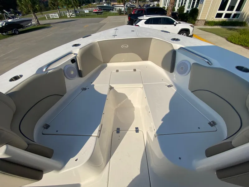 Slide: The Image of 2022 Key West 263 FS boat interior with seating and storage compartments. - 43