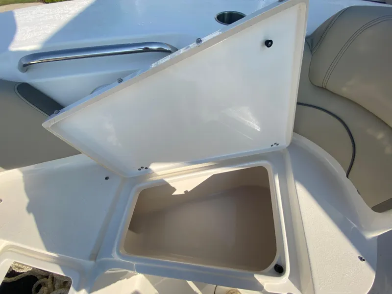 Slide: The Image of Open storage compartment on a 2022 Key West 263 FS boat. - 47