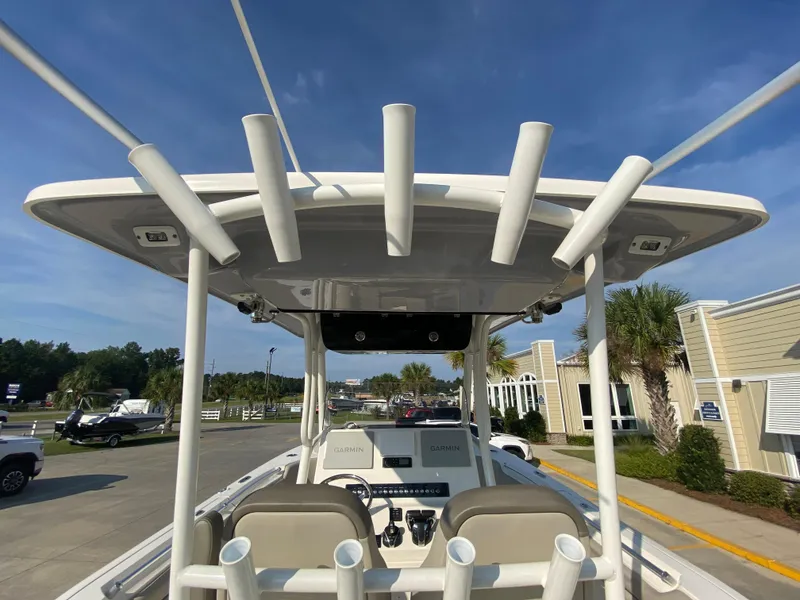 Slide: The Image of 2022 Key West 263 FS boat with T-top and rod holders. - 7