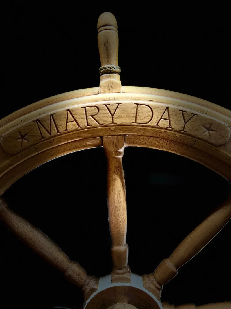 Slide: The Image of Wooden ship wheel with "Mary Day" engraving, from a 1962 Gamage Coastal Gaff Rigged Schooner. - 19