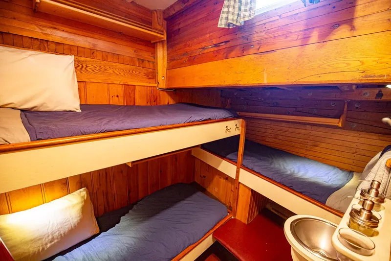 Slide: The Image of Cozy wooden bunk beds in 1962 Gamage Coastal Gaff Rigged Schooner cabin interior. - 40