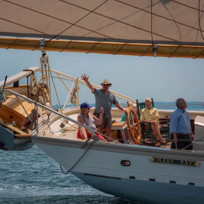 Slide: The Image of Gamage Coastal Gaff Rigged Schooner, 1962, sailing with crew on a sunny day. - 44