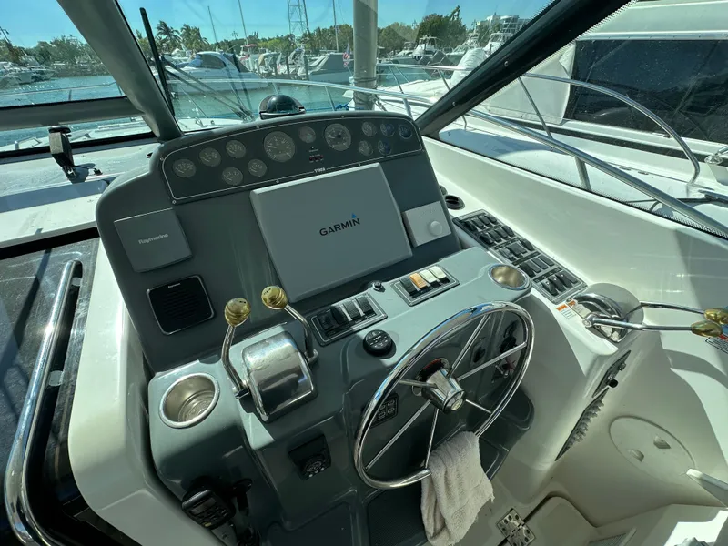Slide: The Image of 2004 Tiara Yachts 3600 Sovran helm with Garmin navigation system. - 14