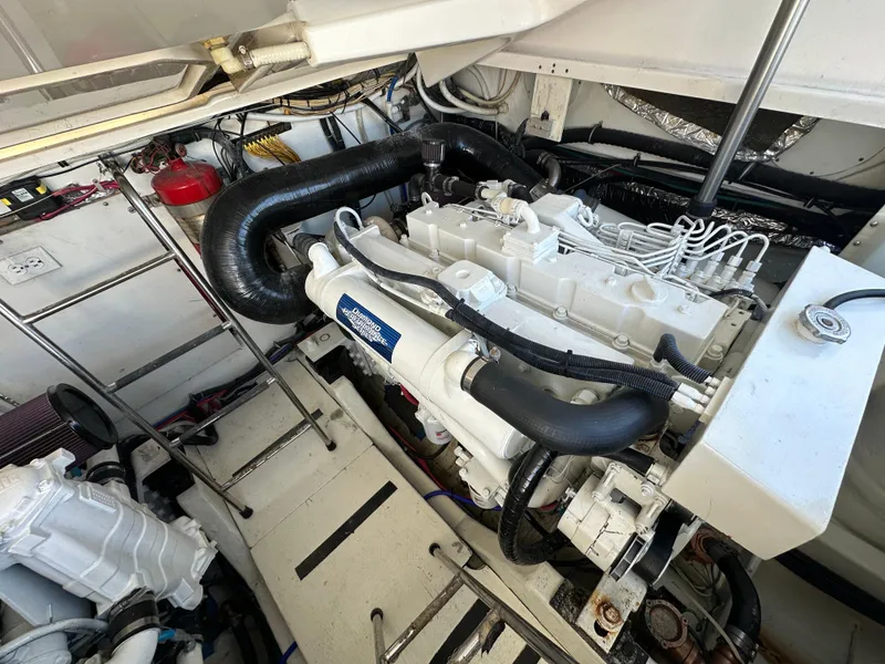 Slide: The Image of Engine compartment of a 2004 Tiara Yachts 3600 Sovran with visible components. - 23