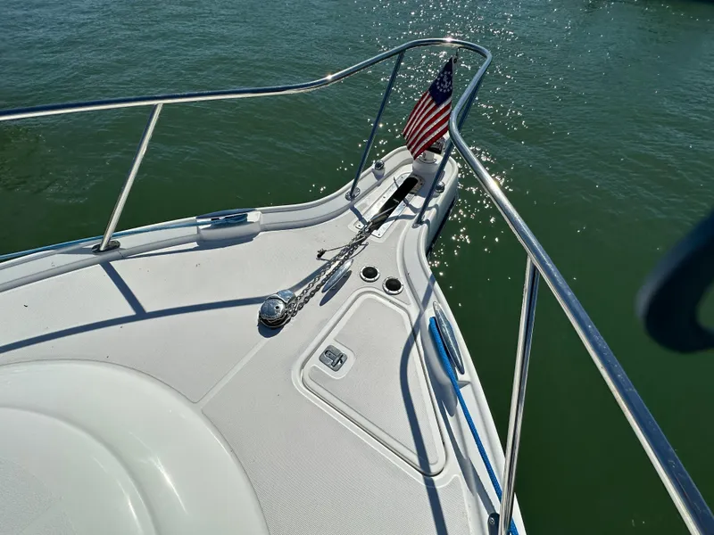 Slide: The Image of Bow of 2004 Tiara Yachts 3600 Sovran with American flag. - 8