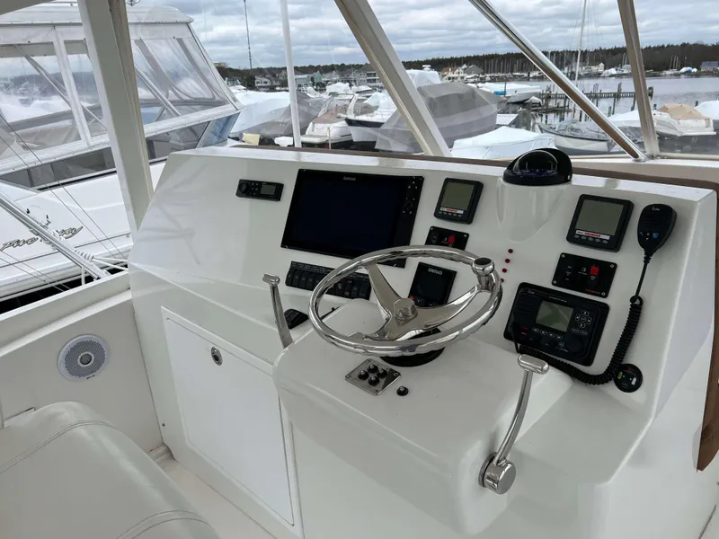 Slide: The Image of Helm station of 2021 Henriques 50 Sportfisherman with modern navigation equipment. - 17