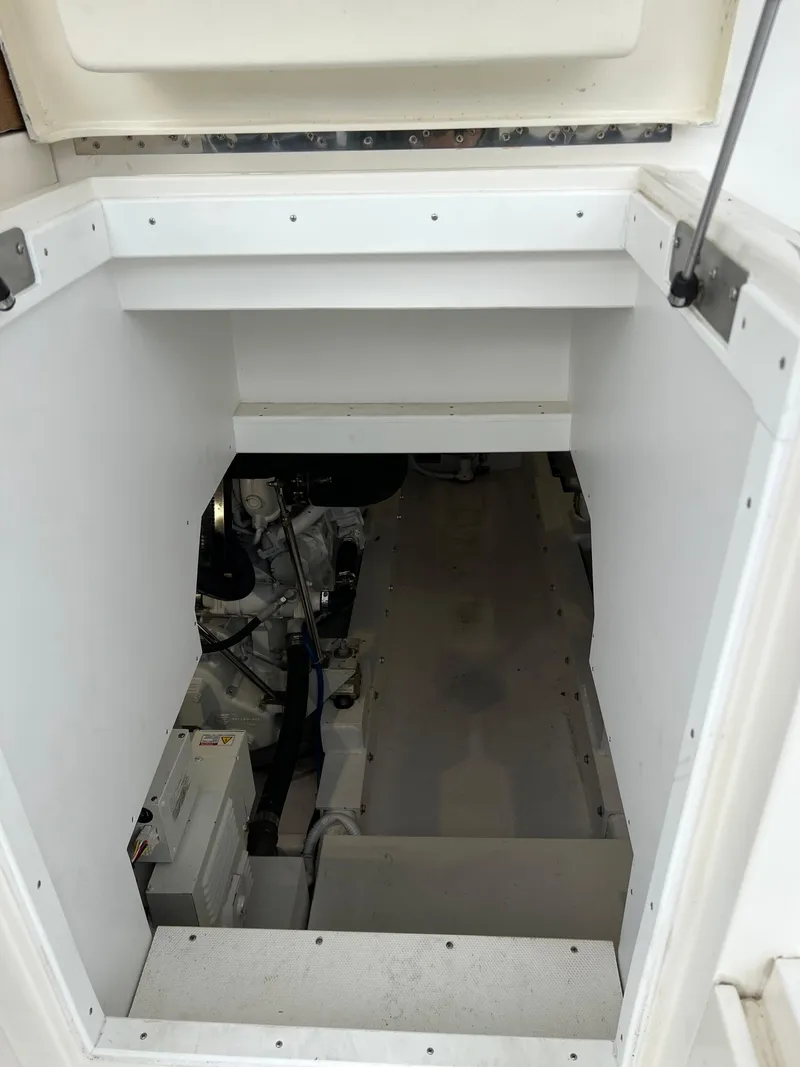 Slide: The Image of Engine room of a 2021 Henriques 50 Sportfisherman boat. - 25