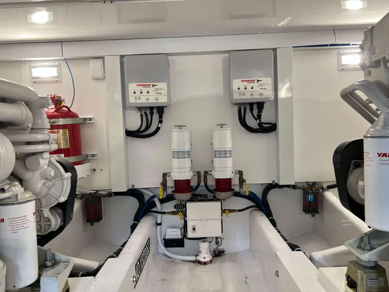 Slide: The Image of Engine room of a 2021 Henriques 50 Sportfisherman with Yanmar components. - 30