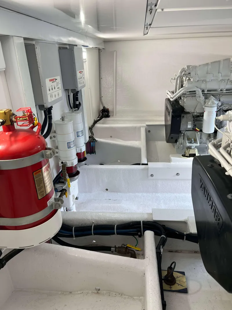 Slide: The Image of Engine room of a 2021 Henriques 50 Sportfisherman boat. - 35