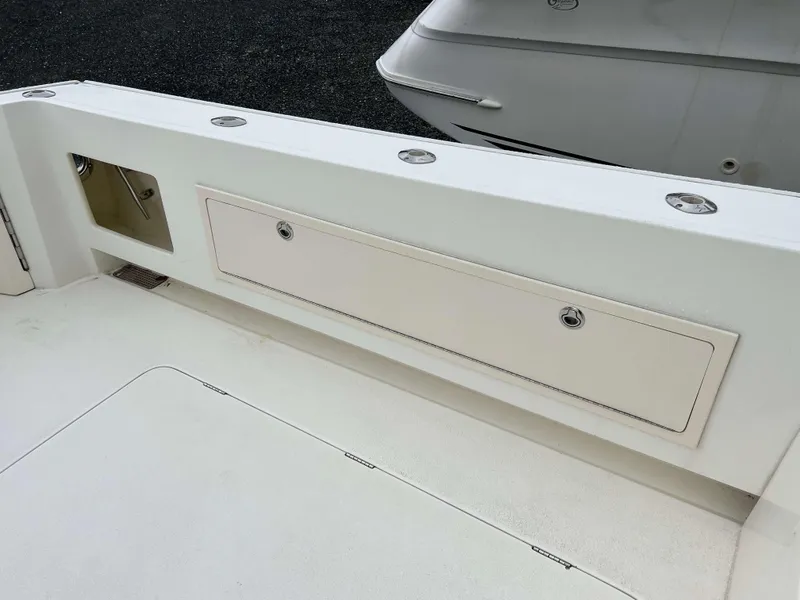 Slide: The Image of Henriques 50 Sportfisherman 2021 boat deck with storage compartments. - 6