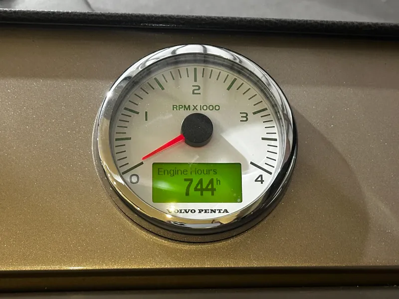 Slide: The Image of Volvo Penta tachometer showing 744 engine hours on Prestige 500, 2013 model. - 11
