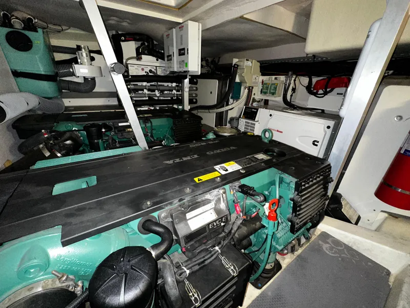 Slide: The Image of Engine room of a 2013 Prestige 500 yacht, featuring Volvo Penta engines and electrical systems. - 30