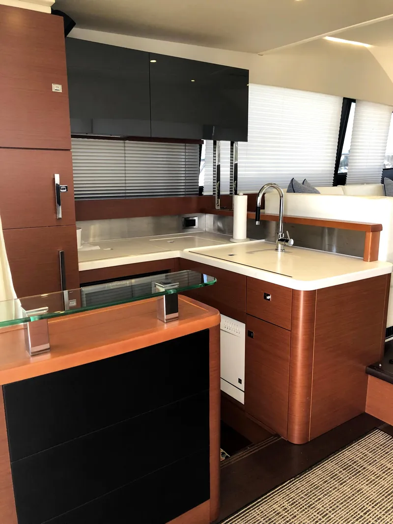 Slide: The Image of Modern kitchen interior on 2013 Prestige 500 yacht with sleek cabinetry and fixtures. - 8