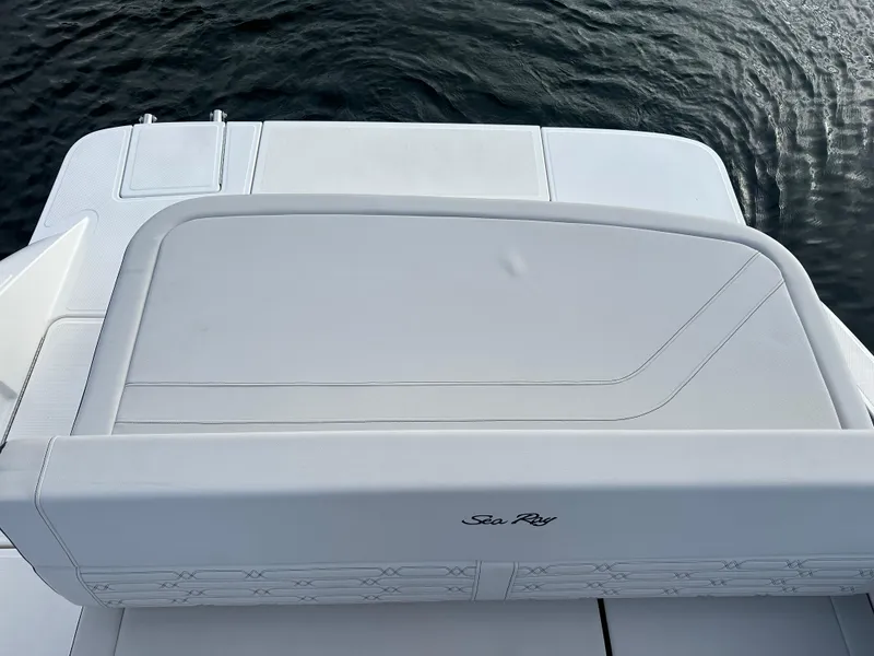 Slide: The Image of 2024 Sea Ray SPX 210 boat's rear seating and swim platform. - 9