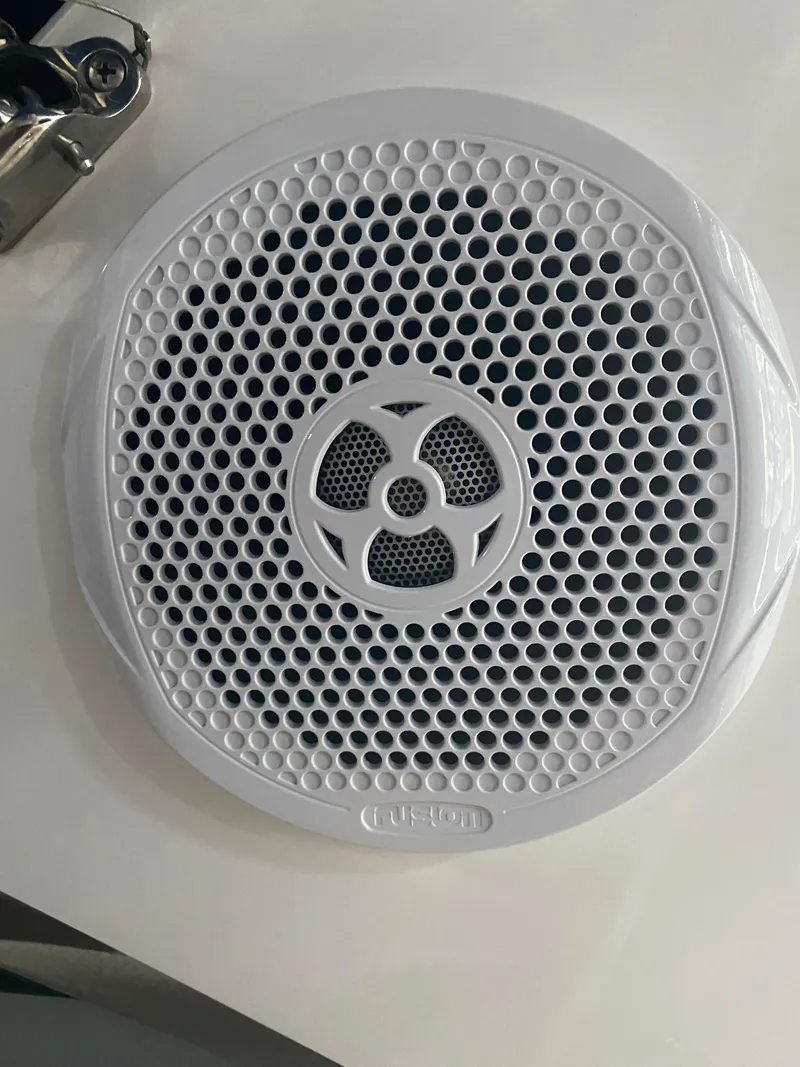 Slide: The Image of White speaker on 2012 Regal 3060 Express Cruiser. - 15