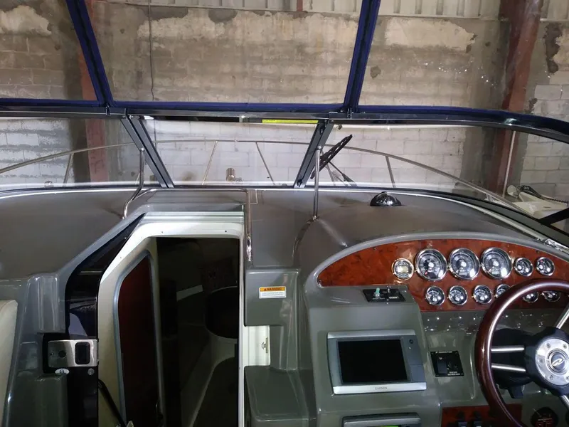 Slide: The Image of Interior view of 2012 Regal 3060 Express Cruiser cockpit. - 5