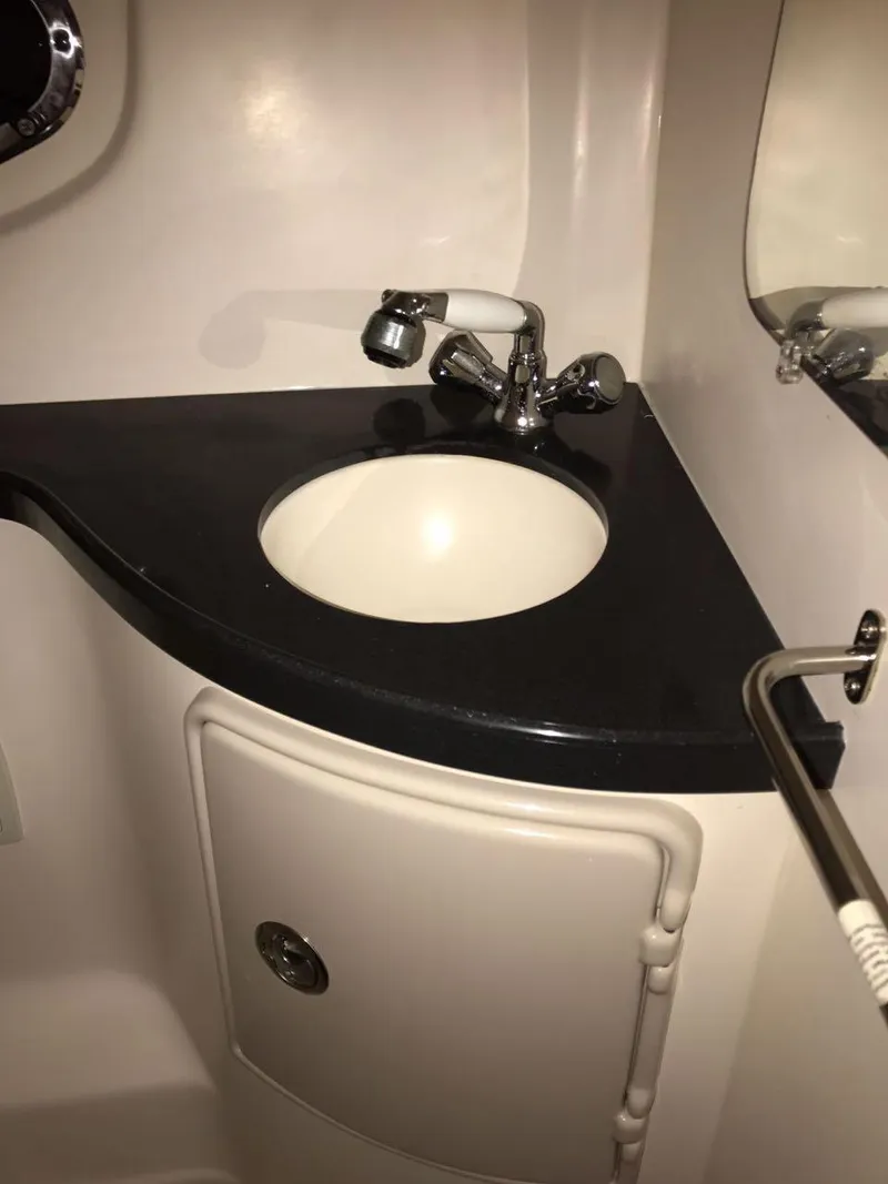 Slide: The Image of Sink in Regal 3060 Express Cruiser, year 2012. - 9