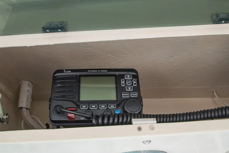 Slide: The Image of VHF marine radio installed on a 1976 Bertram 35 Convertible boat. - 36