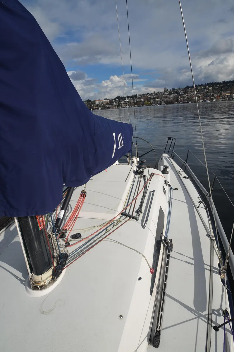 Slide: The Image of 2011 J Boats J/111 sailboat deck with blue sail cover. - 10