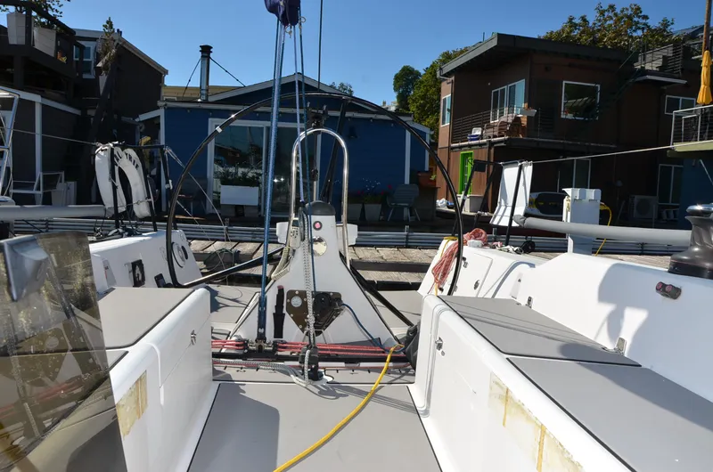 Slide: The Image of 2011 J Boats J/111 sailboat cockpit with marina view. - 13