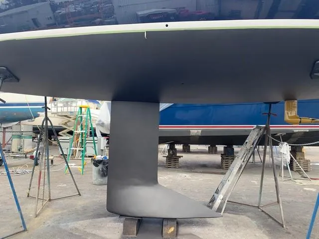 Slide: The Image of 2011 J Boats J/111 sailboat keel and hull in a boatyard. - 35