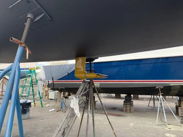 Slide: The Image of 2011 J Boats J/111 sailboat under maintenance in a boatyard. - 38