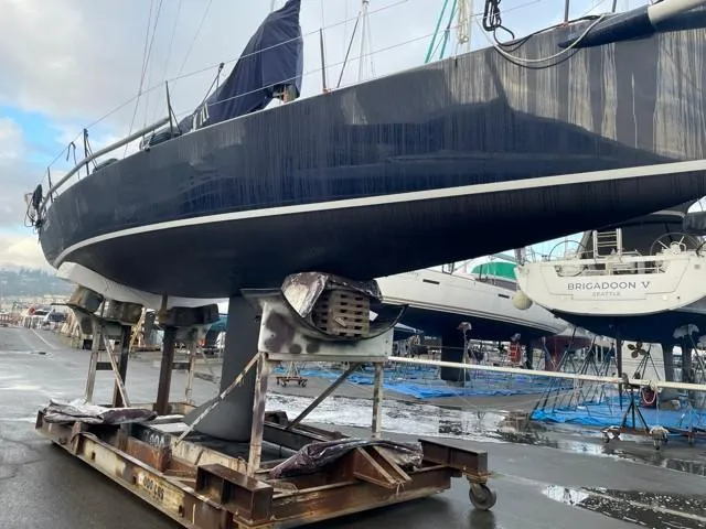 Slide: The Image of 2011 J Boats J/111 sailboat on a trailer in a boatyard, ready for maintenance. - 41