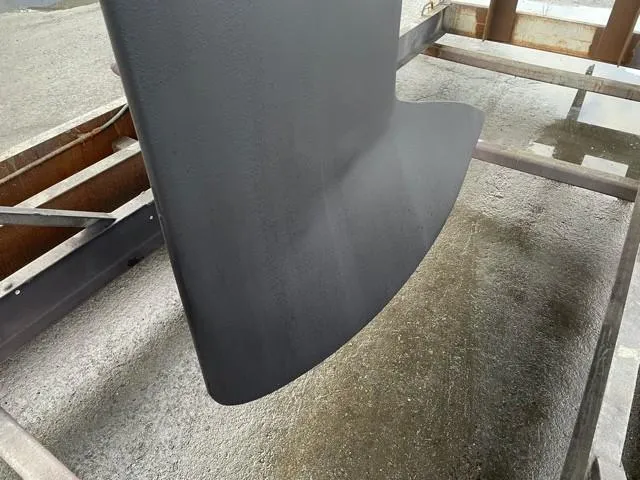 Slide: The Image of J/111 2011 keel on a stand, showcasing sleek design and craftsmanship. - 45