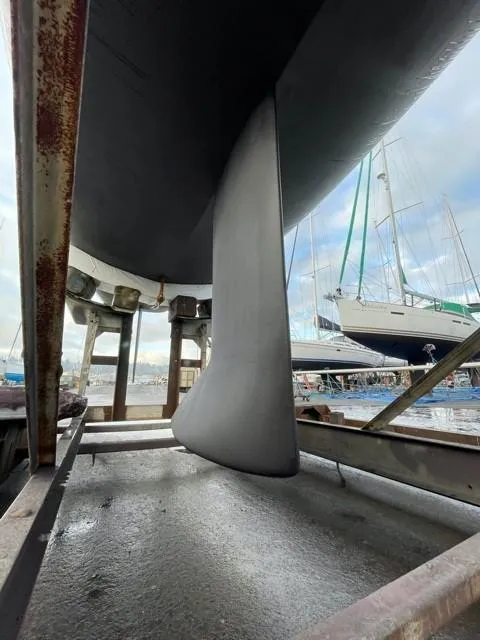 Slide: The Image of 2011 J Boats J/111 keel in dry dock, showcasing sleek design and craftsmanship. - 48