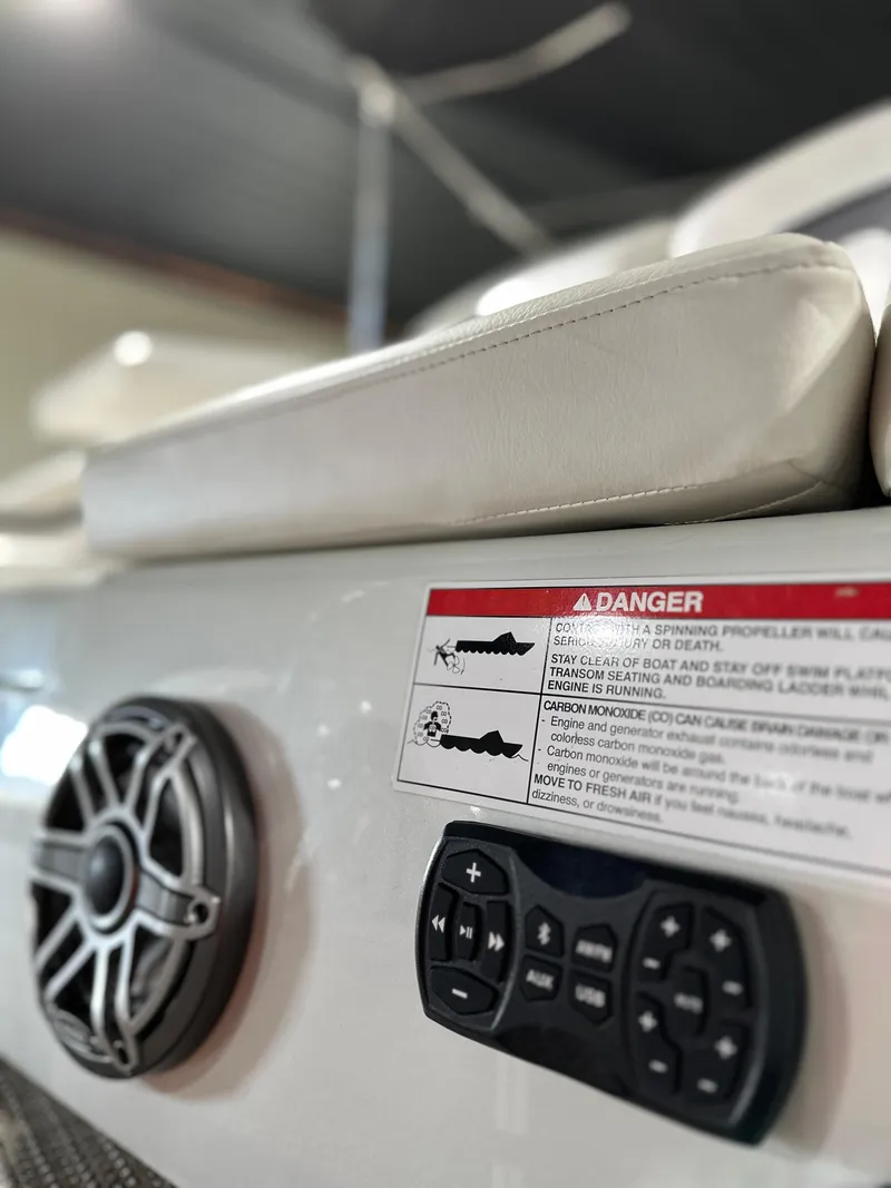 Slide: The Image of Close-up of 2019 South Bay 25SPORT CR9 3.0 boat controls and speaker. - 15