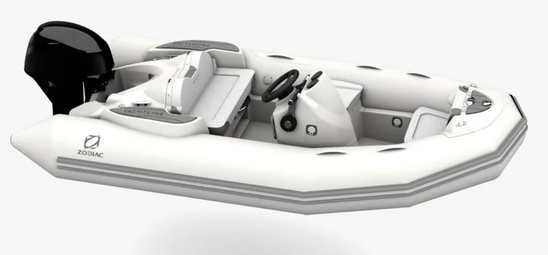 Slide: The Image of 2024 Zodiac Yachtline 360 inflatable boat with outboard motor, white and grey design. - 9