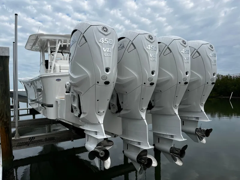 Slide: The Image of 2024 Regulator 41 boat with quad 450 V8 engines docked. - 16