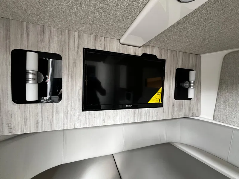 Slide: The Image of 2024 Regulator 41 cabin interior with TV and modern lighting. - 40