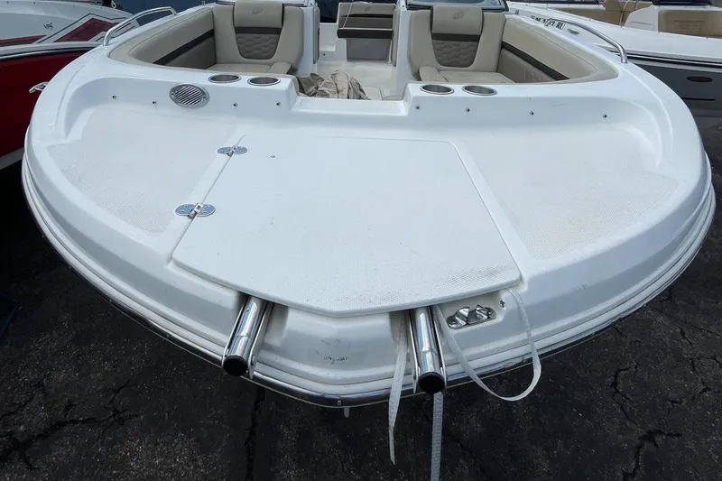 Slide: The Image of 2019 Hurricane 217 Sundeck boat, front view with seating and cup holders. - 2
