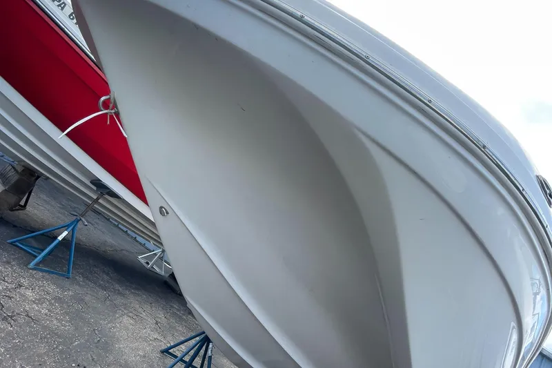 Slide: The Image of 2019 Hurricane 217 Sundeck boat hull on stands. - 3