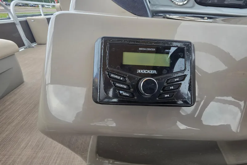 Slide: The Image of 2023 Sun Tracker Bass Buggy 18 DLX media center with Kicker audio system. - 23