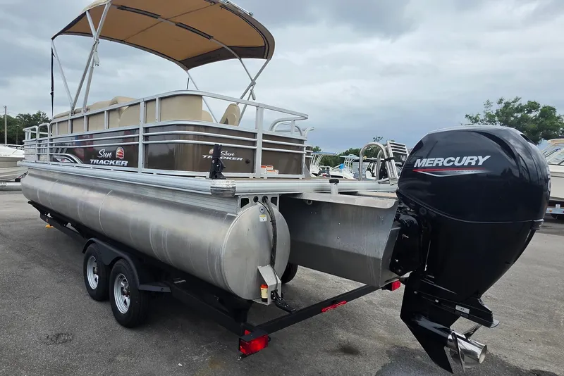 Slide: The Image of 2023 Sun Tracker Bass Buggy 18 DLX pontoon boat with Mercury outboard motor. - 6