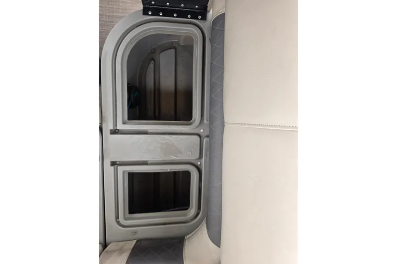 Slide: The Image of Interior view of 2023 Sun Tracker Bass Buggy 18 DLX boat, featuring seating and storage. - 57