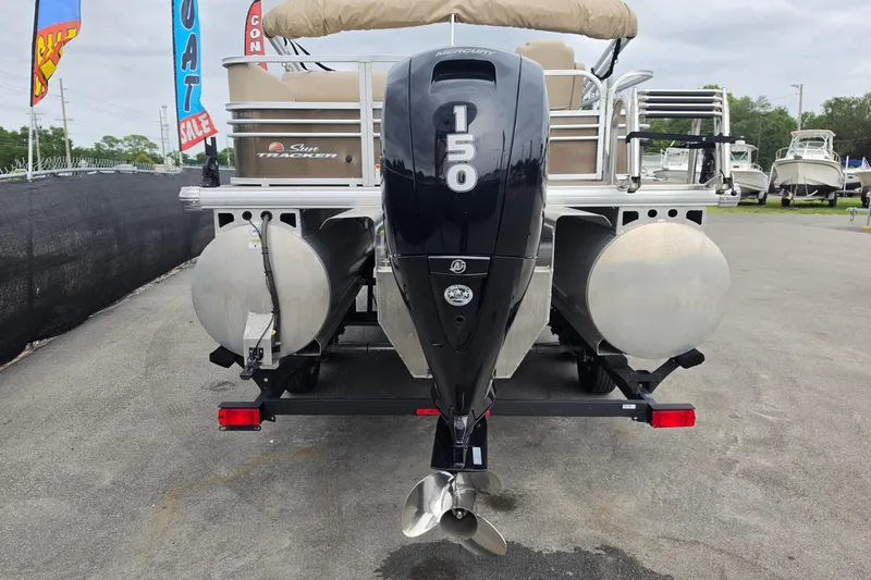Slide: The Image of 2023 Sun Tracker Bass Buggy 18 DLX pontoon boat with Mercury 150 engine, displayed for sale. - 3