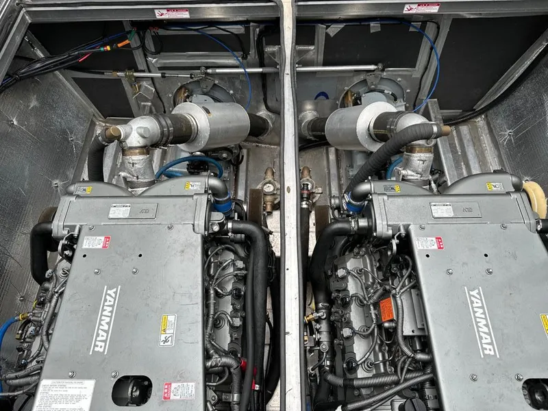 Slide: The Image of Dual Yanmar engines in a 2014 Wooldridge 31 boat. - 10